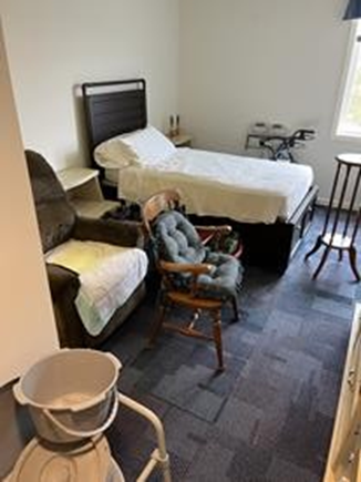 Senior living residence in transition, with furniture prepared for move-in or relocation.