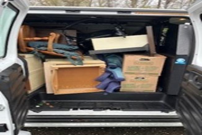 Packed van filled with donated furniture and household items, ready for drop-off to local Denville charities—supporting sustainability and giving back to the community.